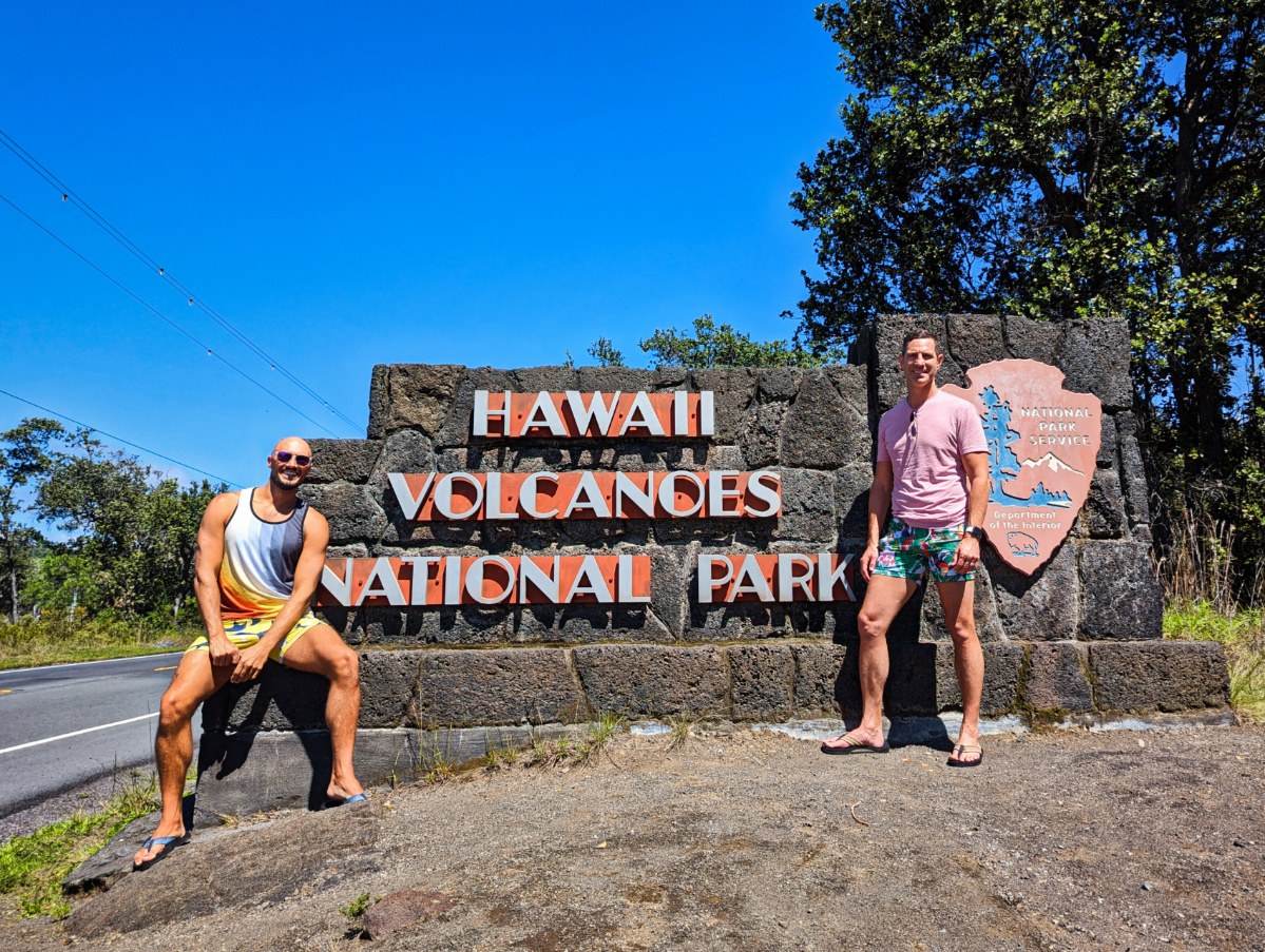 Chris and Rob Taylor at Entrance Sign Hawaii Volcanoes National Park Big Island Hawaii 1