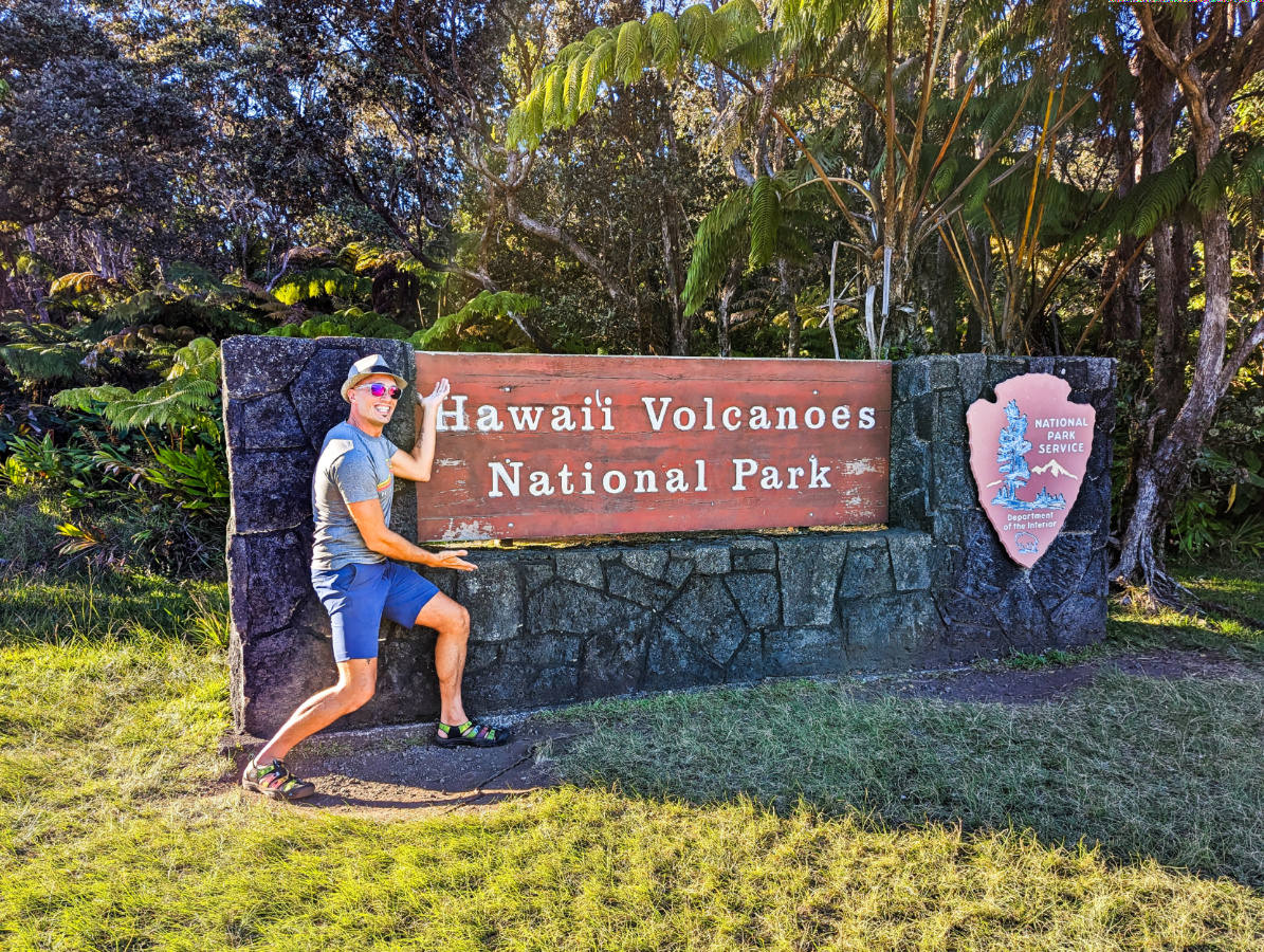 Rob Taylor at Entrance Sign to Hawaii Volcanoes National Park Big Island 2