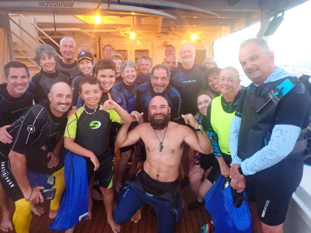 Full Taylor Family and Crew in wetsuits for manta ray snorkel on UnCruise Safari Explorer Big Island Hawaii 1