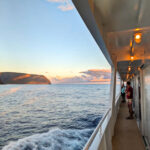 Taylor Family at Sunrise on North Shore Sea Cliffs of Molokai UnCruise Safari Explorer Hawaii 1