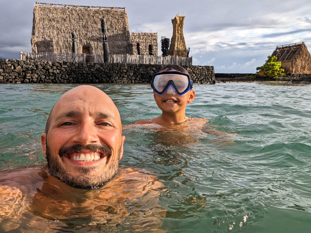 Taylor Family swimming at Kamakahonu National Historic Site Kailua Kona Big Island Hawaii 1