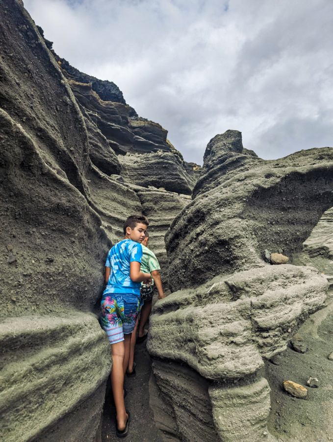 Taylor Family climbing Cliffs at Papakolea Green Sand Beach Big Island Hawaii 1