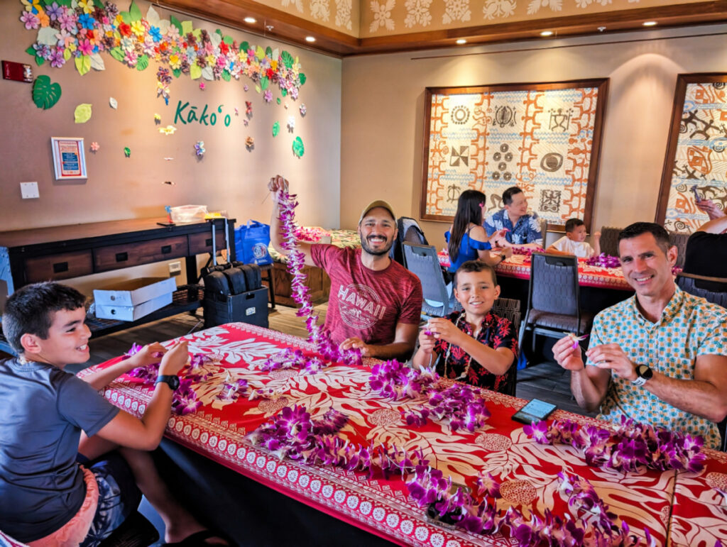 Full Taylor Family making leis at Sheraton Kauai Resort Poipu Kauai Hawaii 1