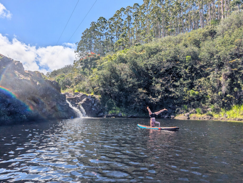 Lifeguard on SUP waterfall swimming at Umauma Experience Hilo Big Island Hawaii 1