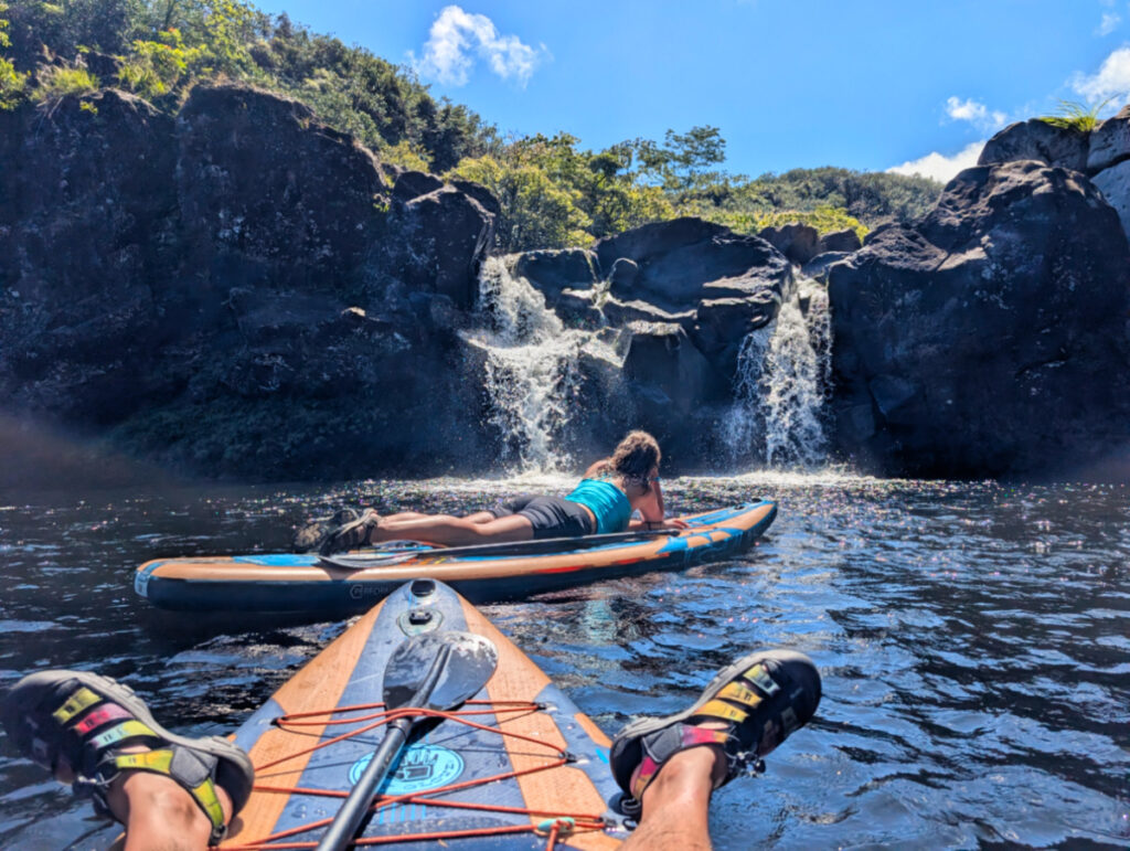 Relaxing on paddleboards at Umauma Falls Umauma Experience Hilo Big Island Hawaii 1