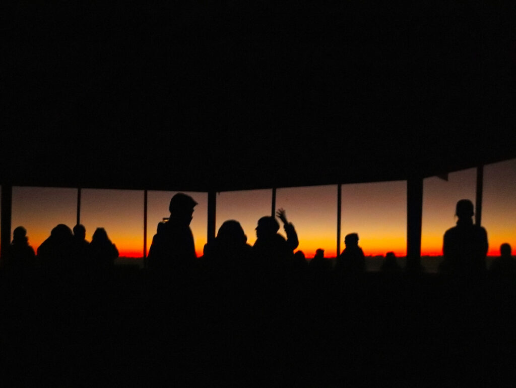 People in Observation Building at Sunrise at the Summit of Haleakala National Park Maui Hawaii 1