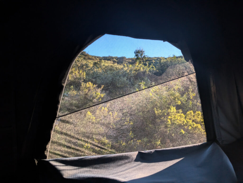 View from inside Rooftop tent on Camping Jeep at Haleakala National Park Maui Hawaii 1