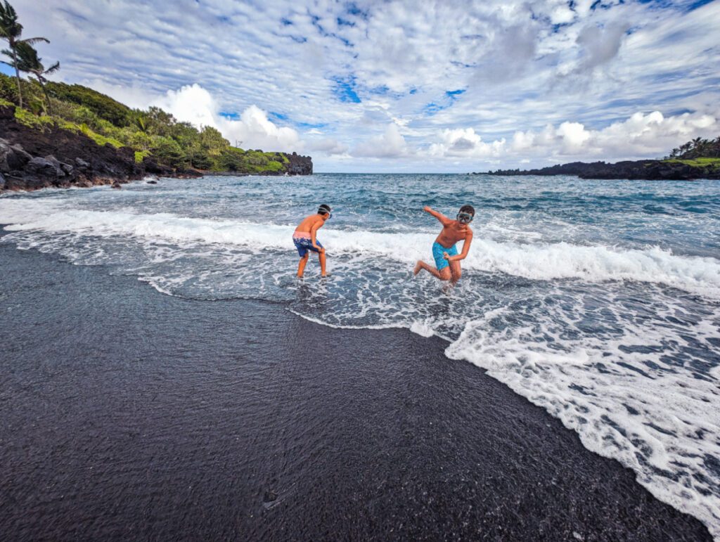 Taylor Family at Black Sand Beach at Waiʻānapanapa State Park Road to Hana Maui Hawaii