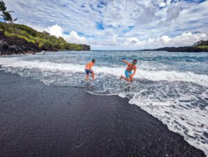 Taylor Family at Black Sand Beach at Waiʻānapanapa State Park Road to Hana Maui Hawaii