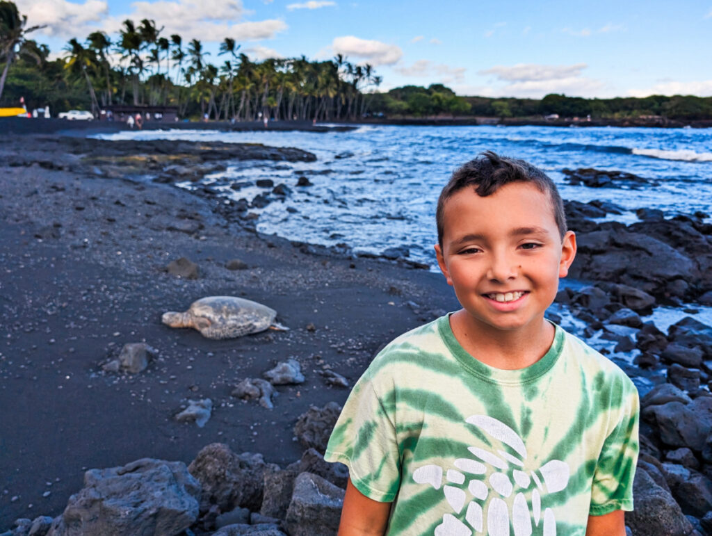 Taylor Family with Honu Hawaiian Green Sea Turtle on Punaluu Black Sand Beach Big Island Hawaii